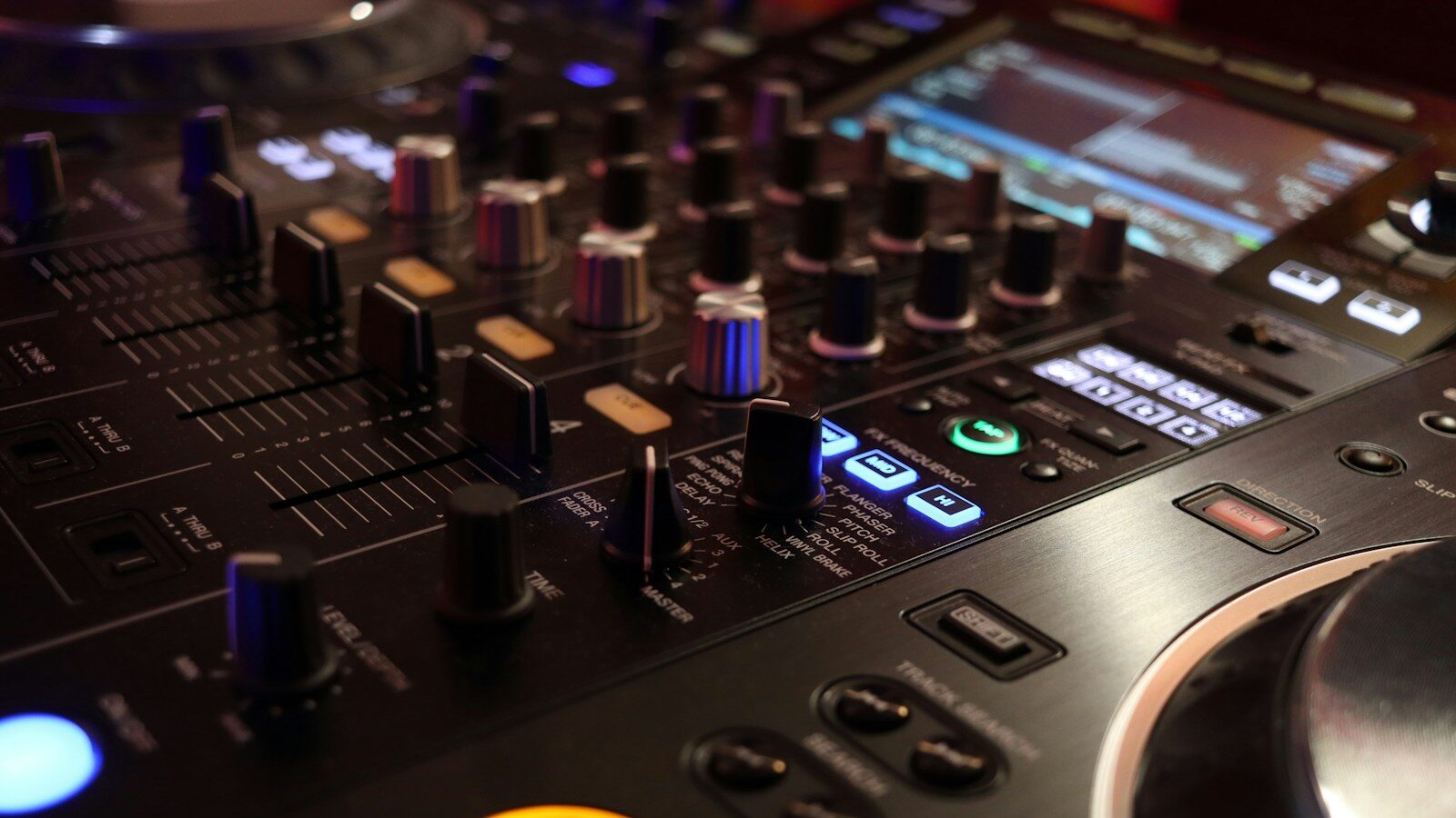 a close up of a dj's control panel