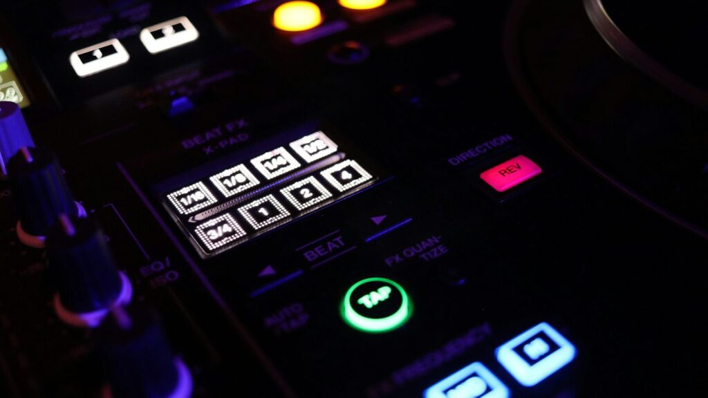 a close up of a control panel in a recording studio